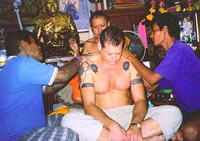 Getting tattooed at Wat Bang Phra - The Temple of the Flying Tiger