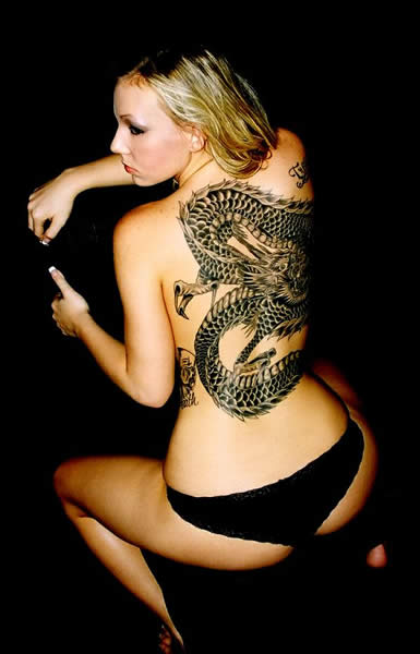 female back tattoos. Pin up girl tattoos, girl back