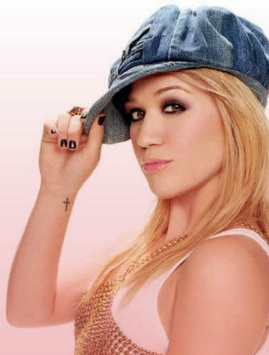 I saw this simple cross tat on Kelly Clarkson when I saw her in concert a 