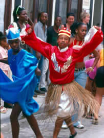 Santera street performance. This religion, based on saint worship and animism, is a fusion of Catholic and West African tribal beliefs that have been popular in Cuba for over 300 years.