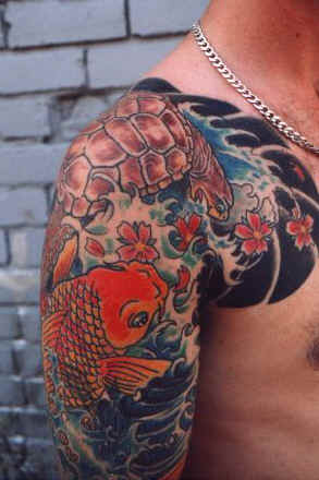 Fish Tattoo design On Shoulder: This is a unique design for you shoulders.