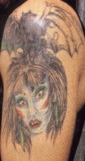 Ozzy osbourne tattoos photos pictures pics of his many tattoos.