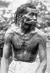 Lower Konyak man with chest tattooing, ca. 1925