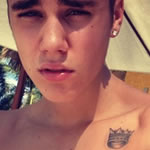 Justin Bieber crown tattoo