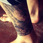 Justin Bieber rose tattoo