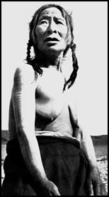 Inuit female with arm tattoos