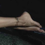 Who's ankle tattoo