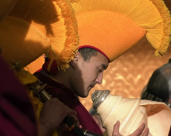 Tibetan Buddhist monk with conch shell