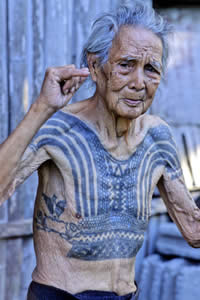 The intricate tattoos that appear on the wrists of the Mentawai people of Siberut Island, Indonesia are called ngalou or beads