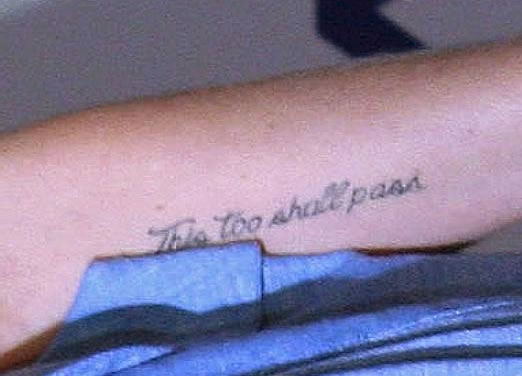 Kim Stewart arm tattoo