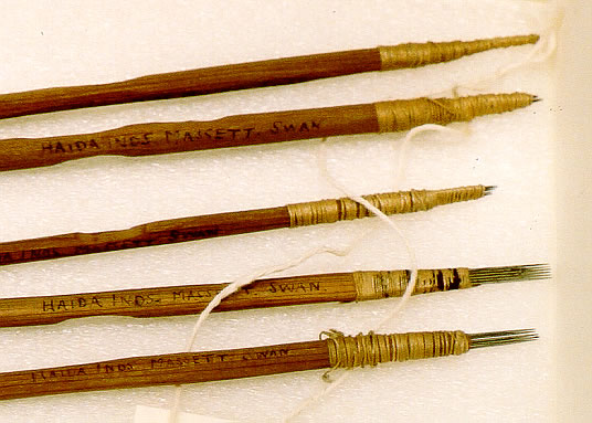 Haida hand-poking tattooing tools, close to life-size.