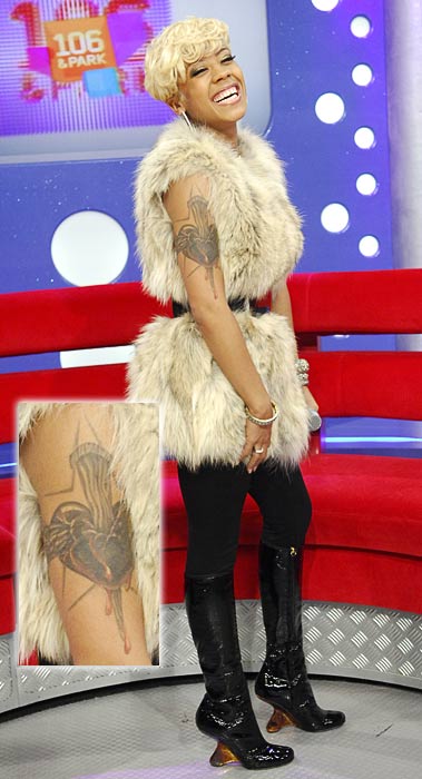 Keyshia Cole tattoos Antonio Browns AB initials on her back