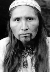 Tolowa. Woman with bold chin tattoos, ca. 1900.