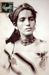 Berber woman from Algeria with facial tattooing, ca. 1920.