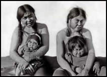 King Island women displaying iqalleq, arm tattoos, ca. 1900.